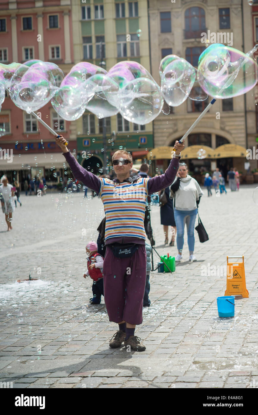 The Man letting soap bubbles Old Market Wroclaw Stock Photo