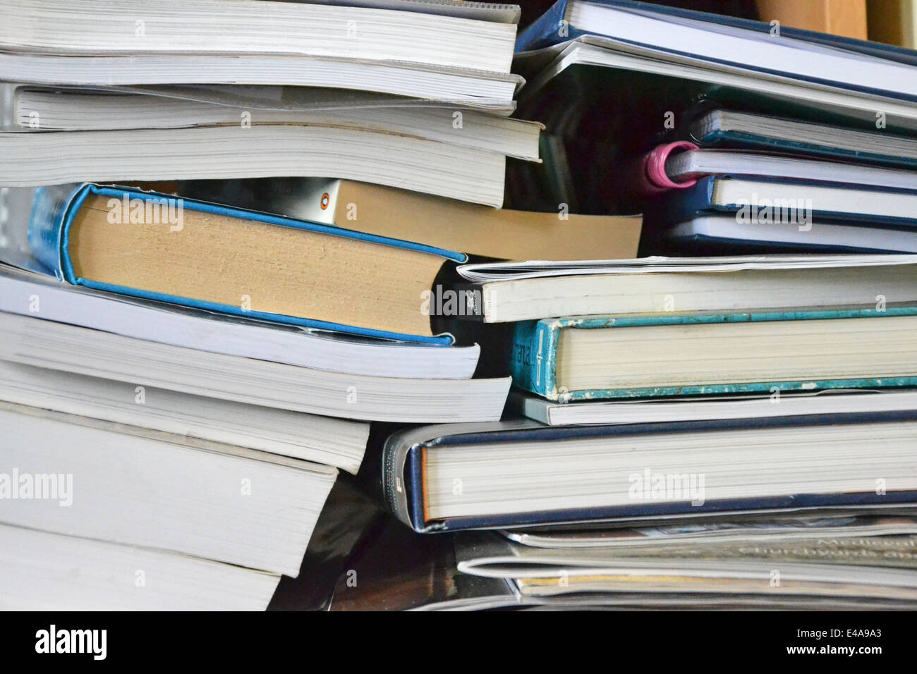 close up of books and journals piled up Stock Photo