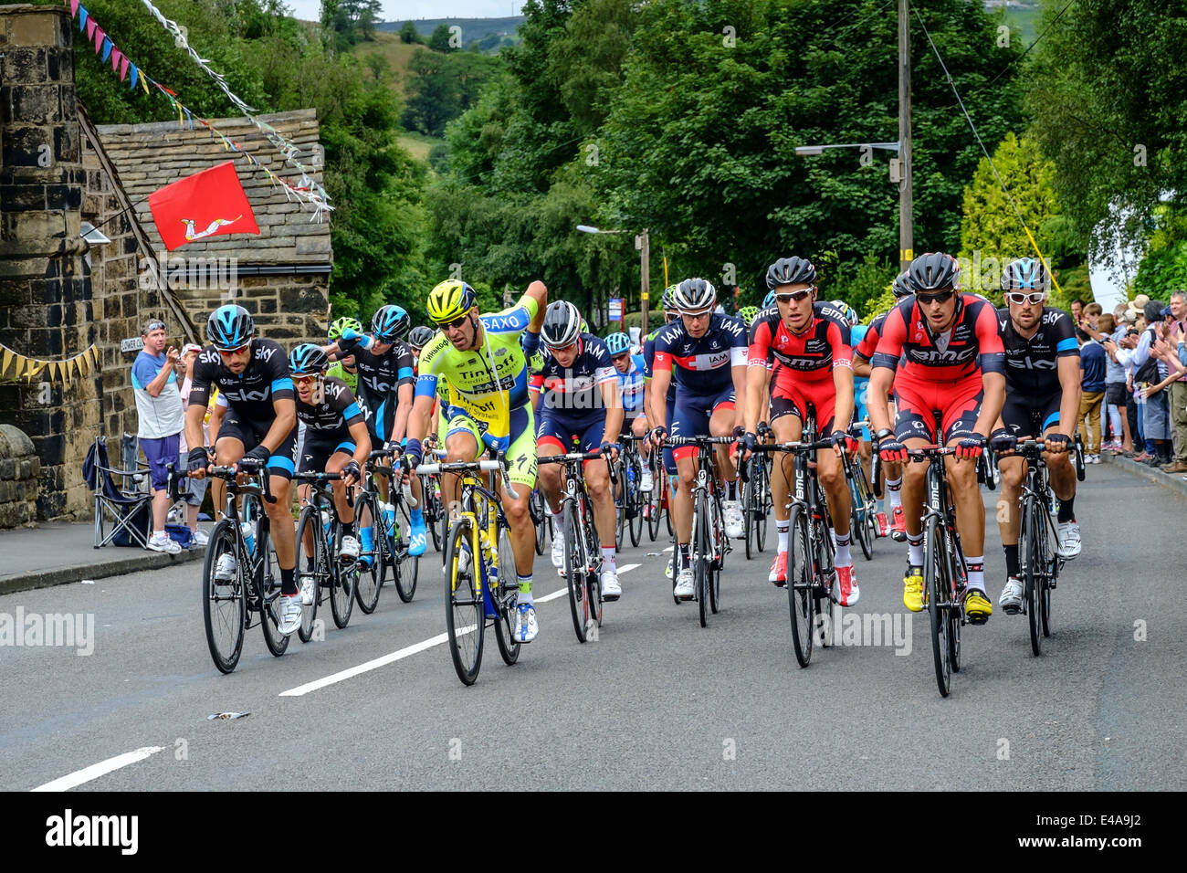 The peloton heading up Cragg Road, Cragg Vale in West Yorkshire during stage 2 of the Grand Depart. Stock Photo