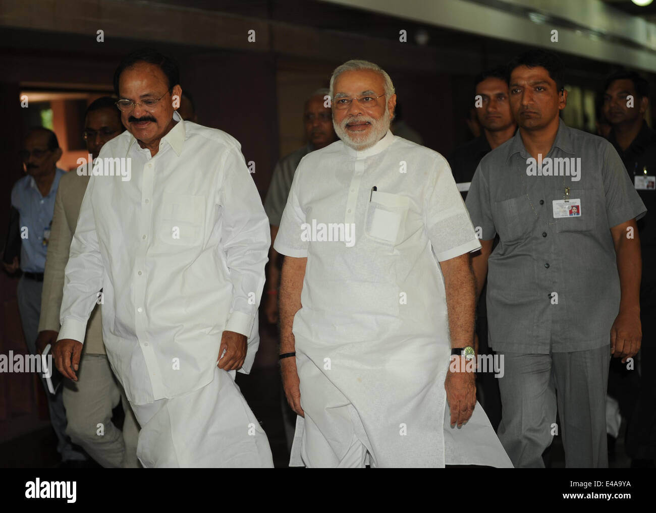 New Delhi, India. 7th July, 2014. Indian Prime Minister Narendra Modi (C) arrives for the commencement of the budget session at the Parliament House in New Delhi, India, July 7, 2014. Credit:  Partha Sarkar/Xinhua/Alamy Live News Stock Photo