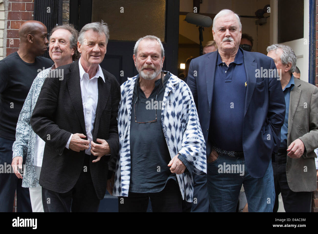 Monty Python photocall with Eric Idle, Michael Palin, Terry Gilliam, John Cleese and Terry Jones (hidden), London Palladium. Stock Photo