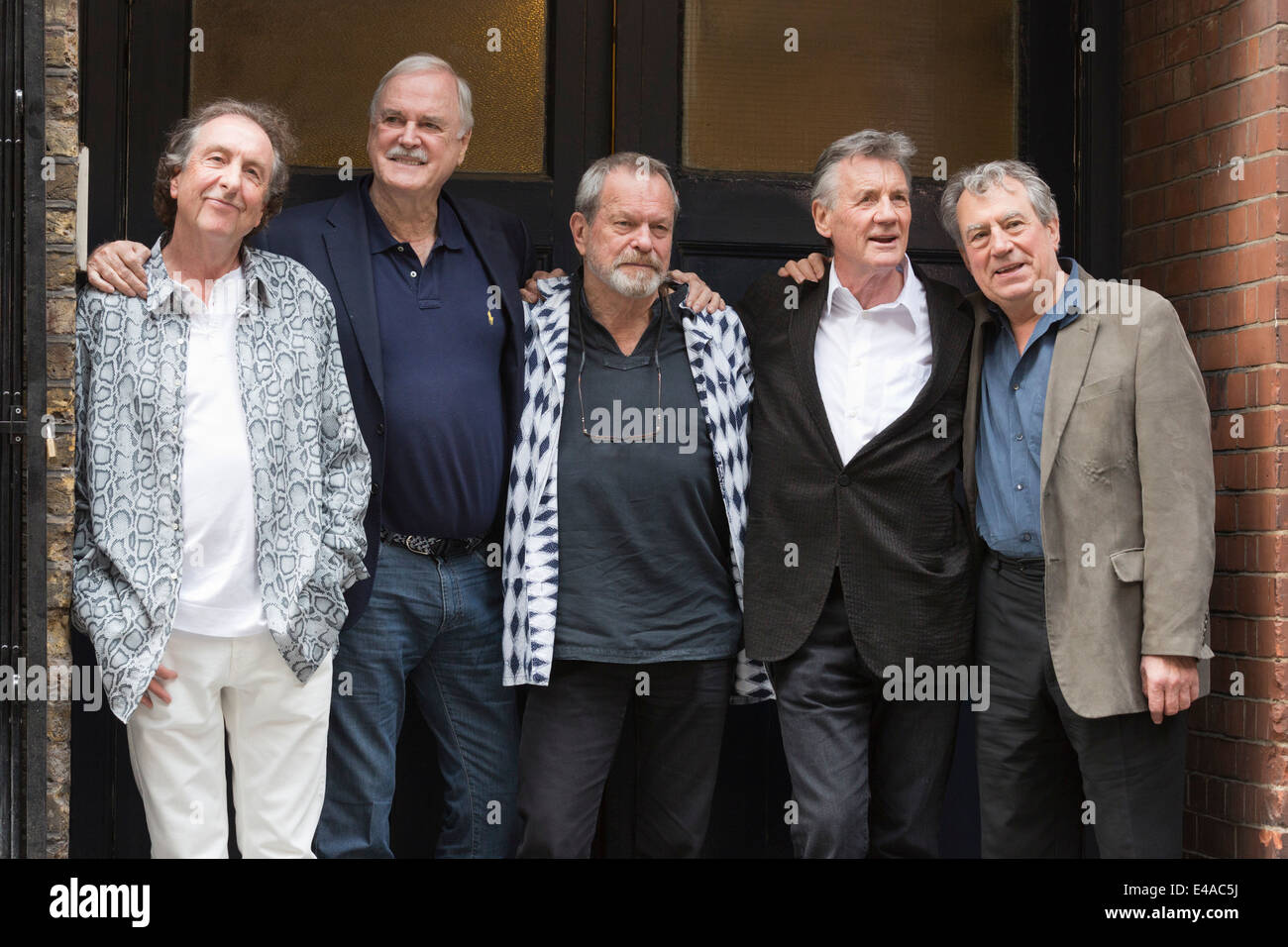 Monty Python members Eric Idle, John Cleese; Terry Gilliam, Michael ...