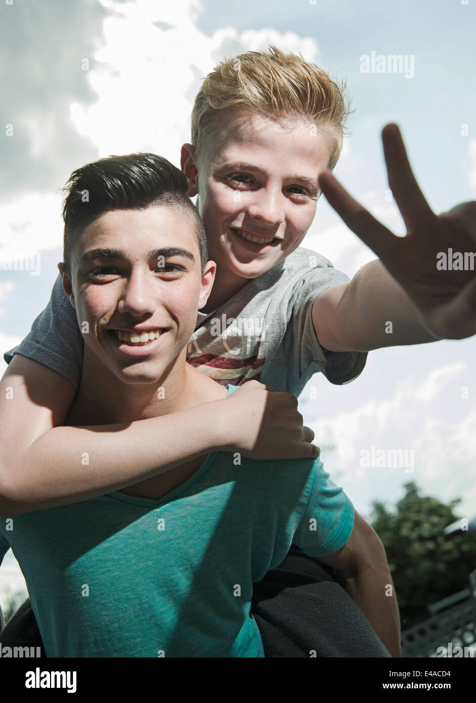 Portrait of two playful boys outdoors Stock Photo - Alamy