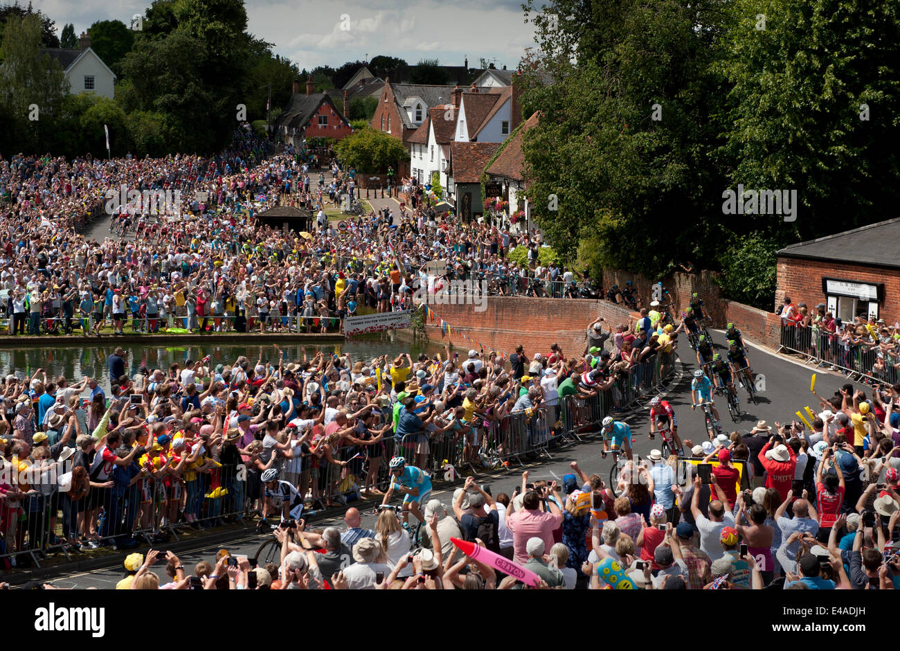 Finchingfield, Essex, UK. 7th July, 2014. Tour de France stage 3 Cambridge to London  The Peloton passing through the village of Finchingfield in north west Essex in the early stages of the third stage of the race today between Cambridge and London. Credit:  BRIAN HARRIS/Alamy Live News Stock Photo