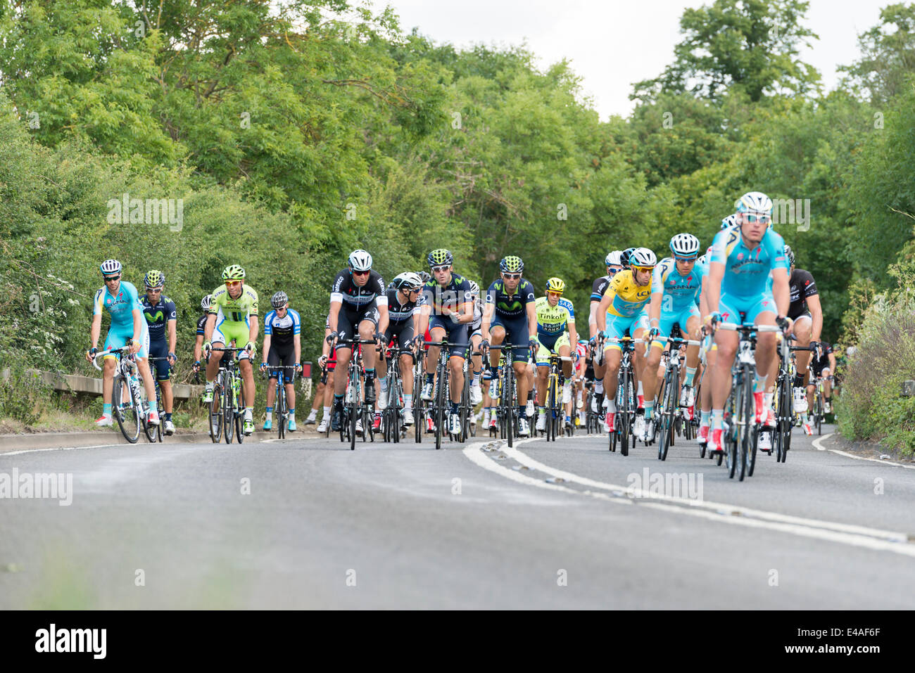 Stapleford near Cambridge, UK. 7th July, 2014.  Competitors in Stage 3 Cambridge to London pass through flat countryside south of Cambridge en route to London. The race attracted thousands of spectators to Cambridge and the route south to Essex and London. Credit:  Julian Eales/Alamy Live News Stock Photo