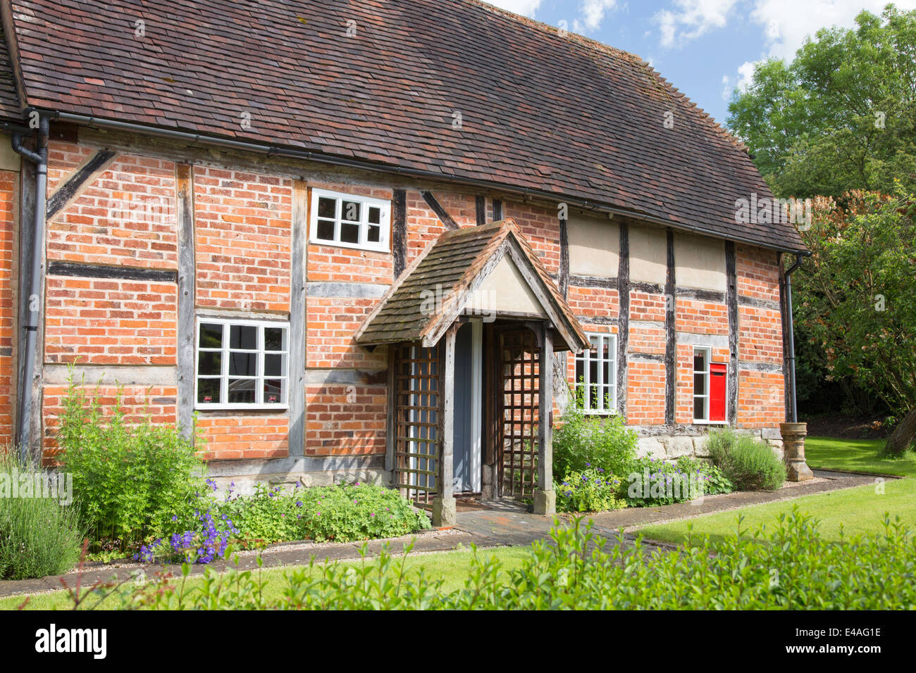 Traditional timber-framed cottage in the village of Lowsonford, Warwickshire, England, UK Stock Photo