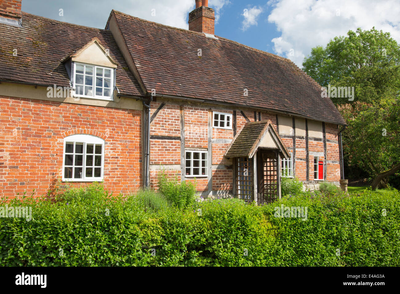 Traditional timber-framed cottage in the village of Lowsonford, Warwickshire, England, UK Stock Photo