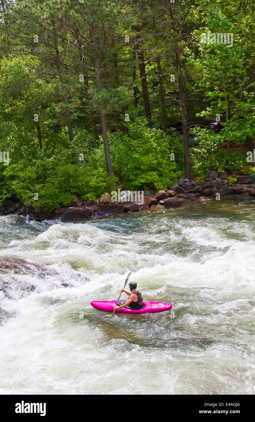 Whitewater kayaker paddling on Ocoee River in Ducktown, Tennessee USA