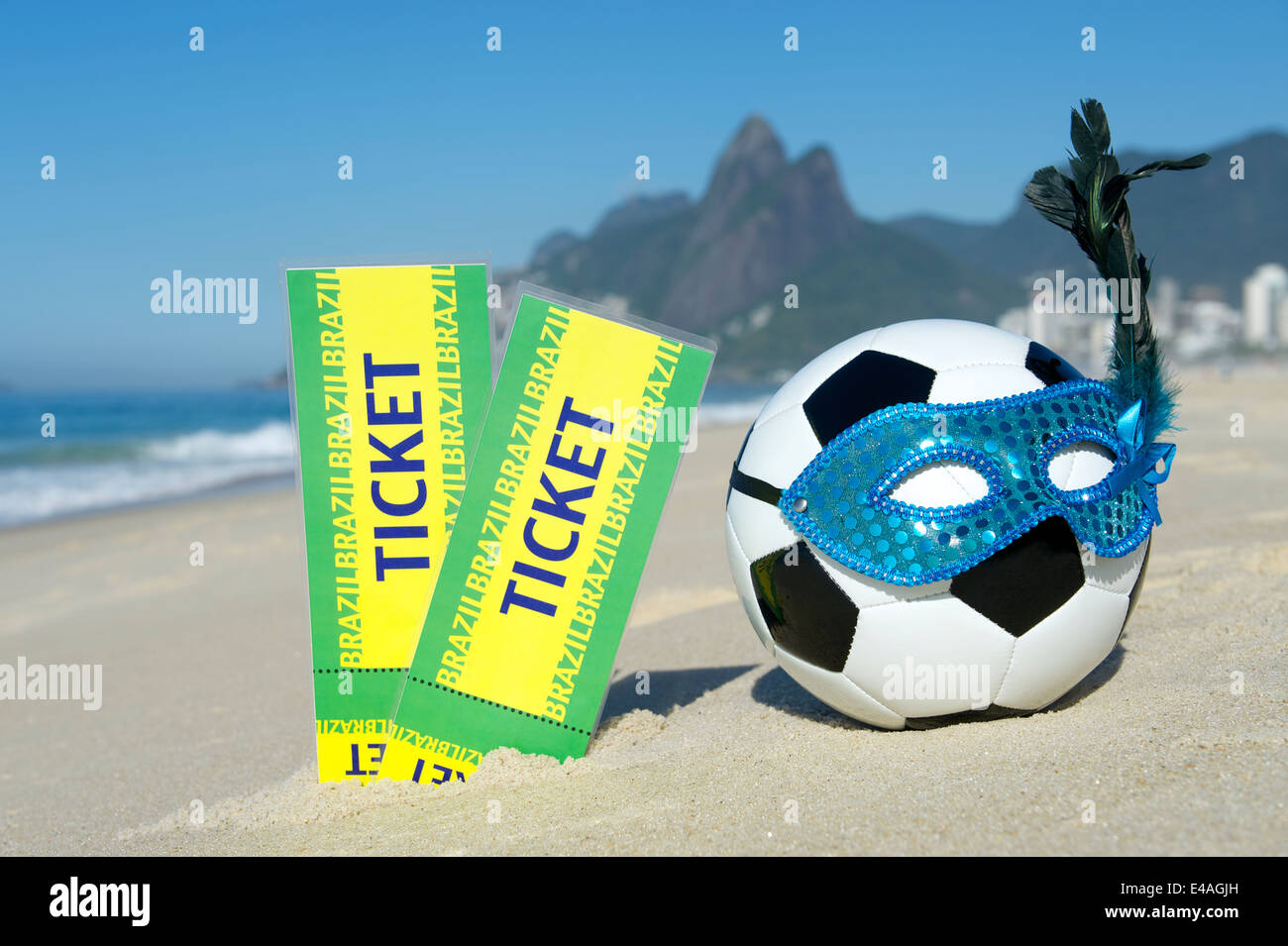 Brazil tickets stand next to soccer theme Rio Carnival football wearing  sparkly mask on Ipanema Beach Stock Photo - Alamy