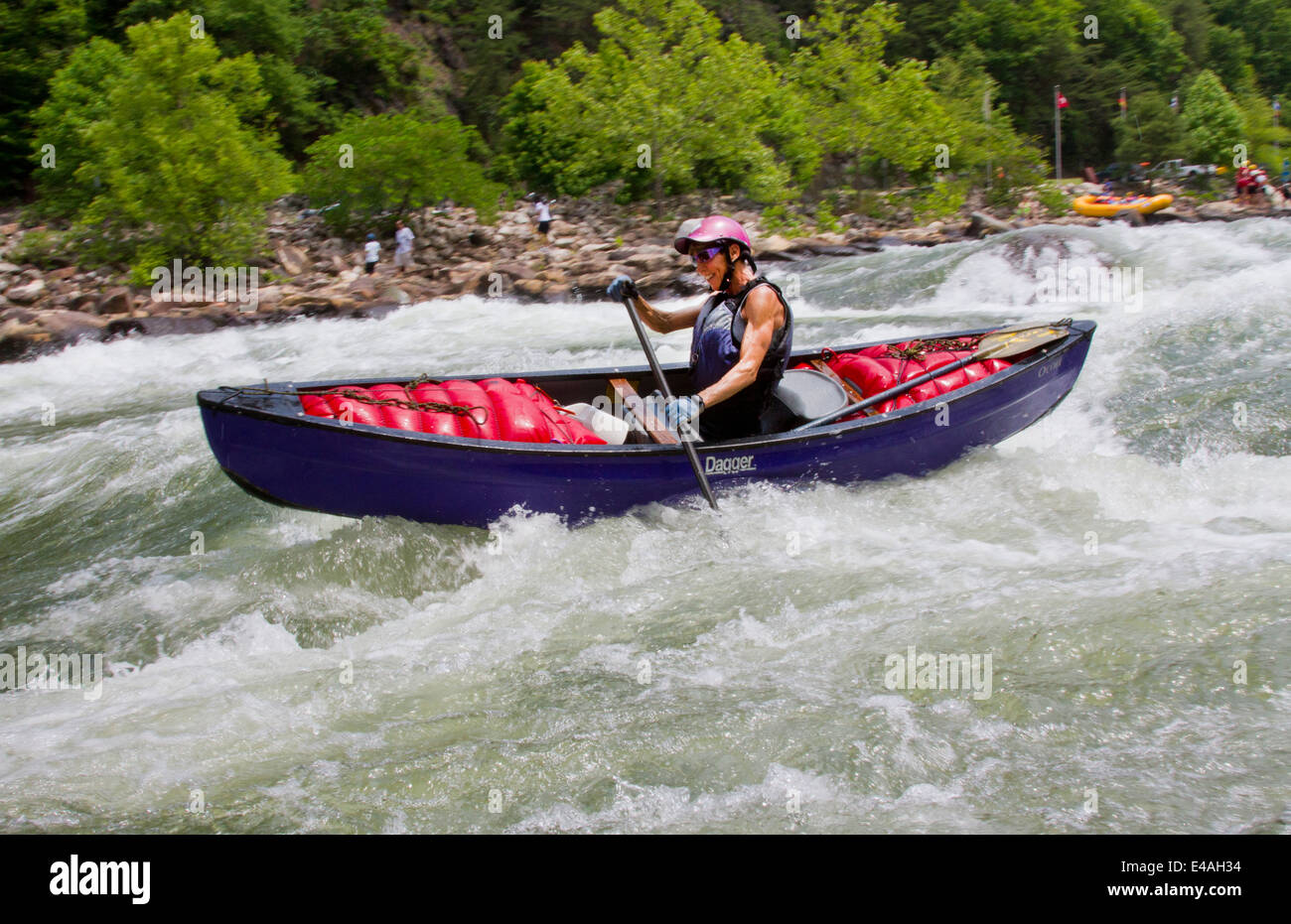 Woman whitewater canoe or kayak on the Ocoee River in Ducktown