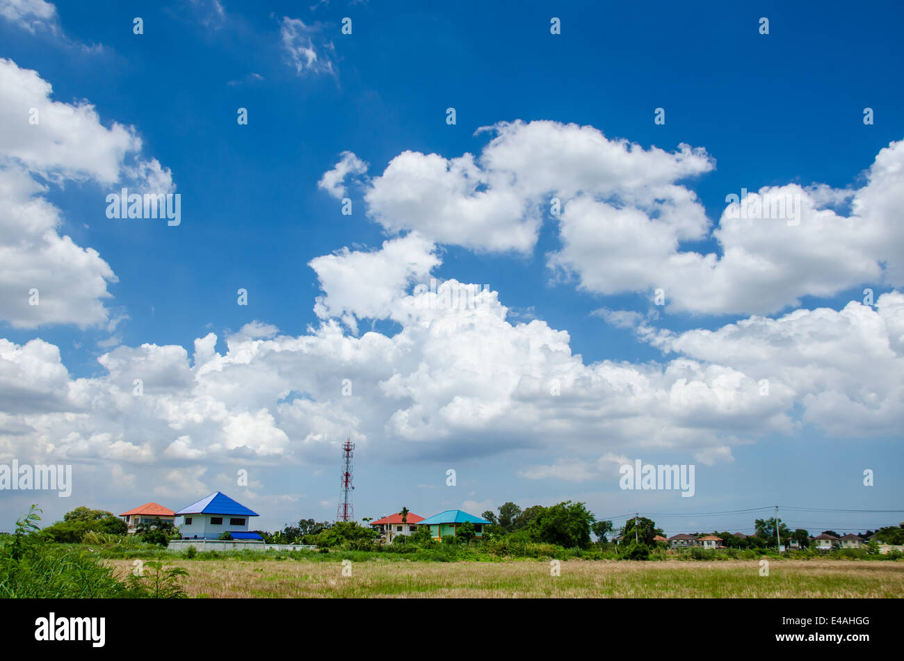 village with blue sky and cloud Stock Photo - Alamy