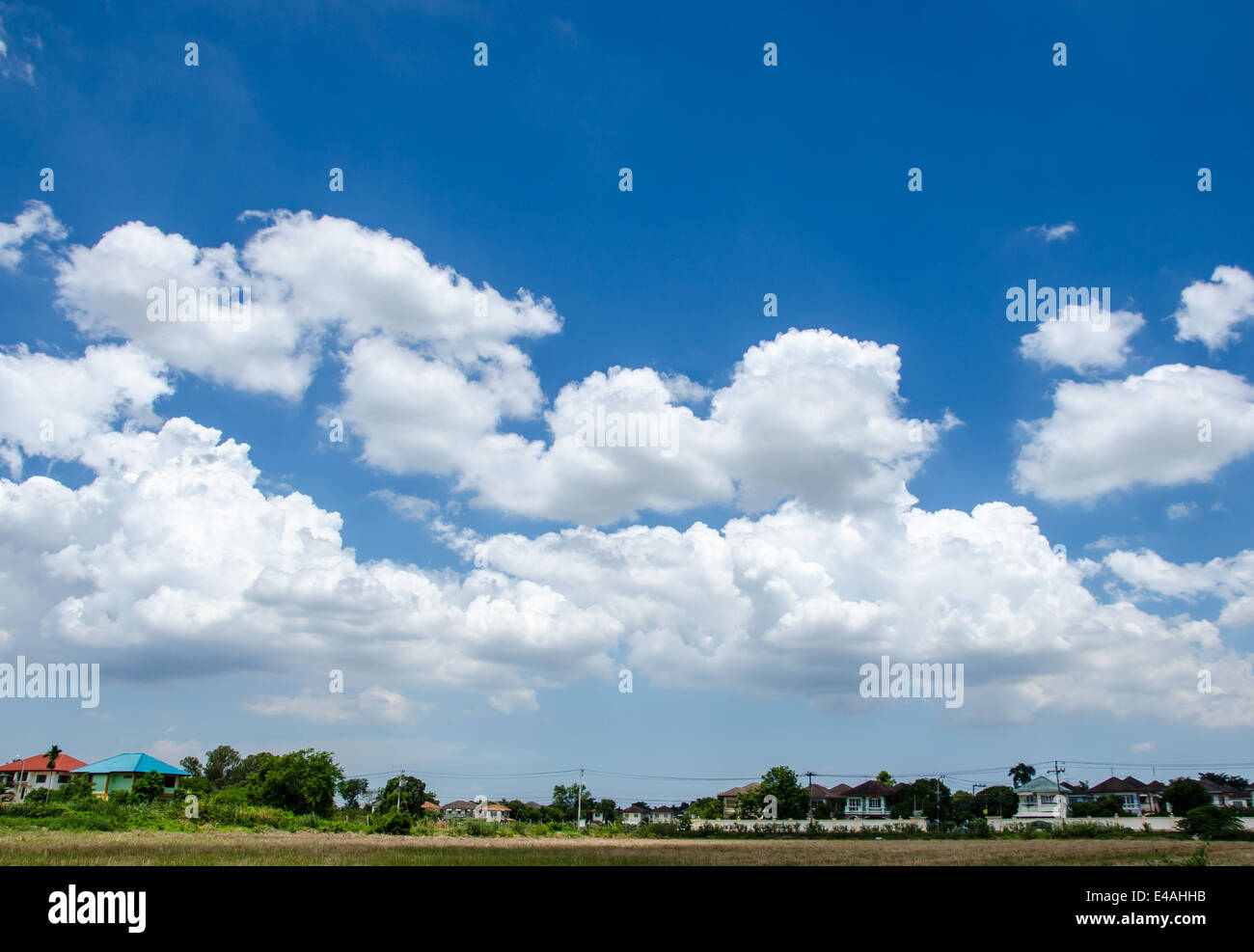 village with blue sky and cloud Stock Photo - Alamy