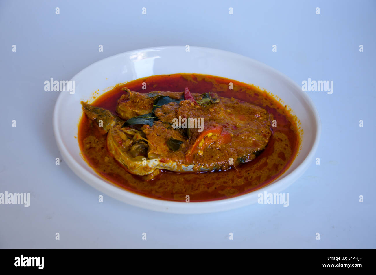 fish curry on white background Stock Photo - Alamy
