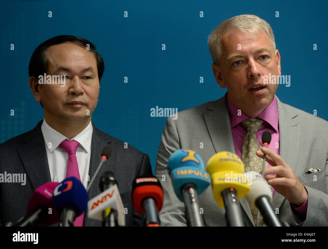 A group of Vietnamese lawyers and several police will arrive in the Czech Republic over the fight against drug crime within a month, the two countries´ interior ministers agreed today, on July 7, 2014 in Prague, Czech Republic. Arrangements are also to be made for Vietnamese serving their prison sentences in their homeland, Czech Interior Minister Milan Chovanec (right) and Vietnamese Home Affairs Minister Nguyen Thai Binh agreed. (CTK Photo/Michal Krumphanzl) Stock Photo
