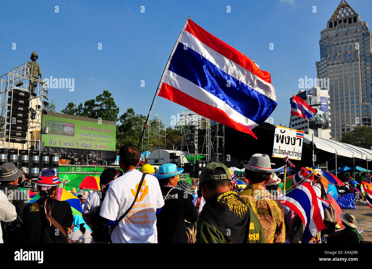 BANGKOK, THAILAND: Protestors listening to speeches at Lumphini Park carrying Thai flags at Operation Shut Down Bangkok Stock Photo
