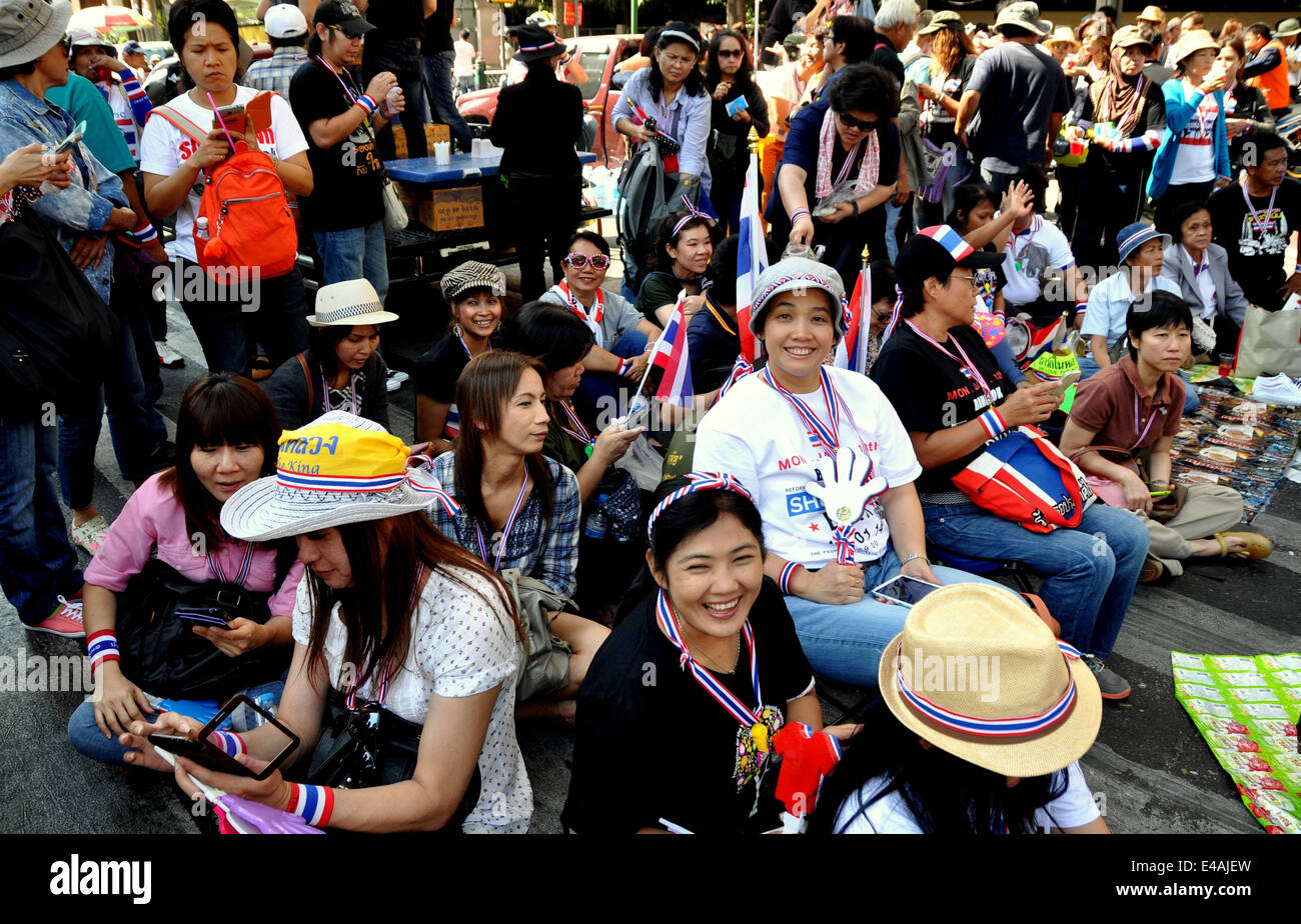 BANGKOK, THAILAND:  Crowds of Thais sitting on Silom Road during anti-government demonstrations Stock Photo