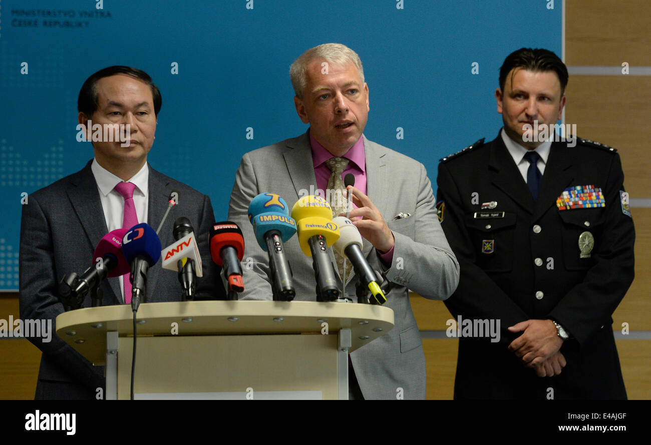 A group of Vietnamese lawyers and several police will arrive in the Czech Republic over the fight against drug crime within a month, the two countries´ interior ministers agreed today, on July 7, 2014 in Prague, Czech Republic. Arrangements are also to be made for Vietnamese serving their prison sentences in their homeland, Czech Interior Minister Milan Chovanec (centre) and Vietnamese Home Affairs Minister Nguyen Thai Binh agreed. Pictured right is Czech Police President Tomas Tuhy. (CTK Photo/Michal Krumphanzl) Stock Photo