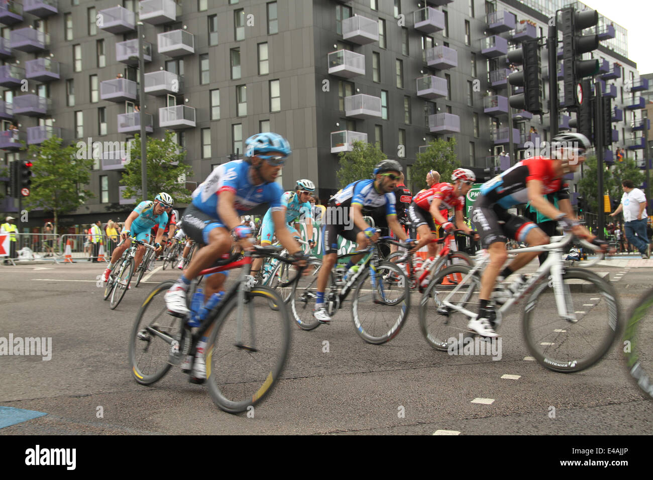 London, UK. 07th July, 2014. London, UK. 07th July, 2014. Rides make their way through Stratford High Street and onto West Ham Lane on Stage 3 of the Tour de France via Newham. Credit:  © david mbiyu/Alamy Live News Credit:  david mbiyu/Alamy Live News Stock Photo