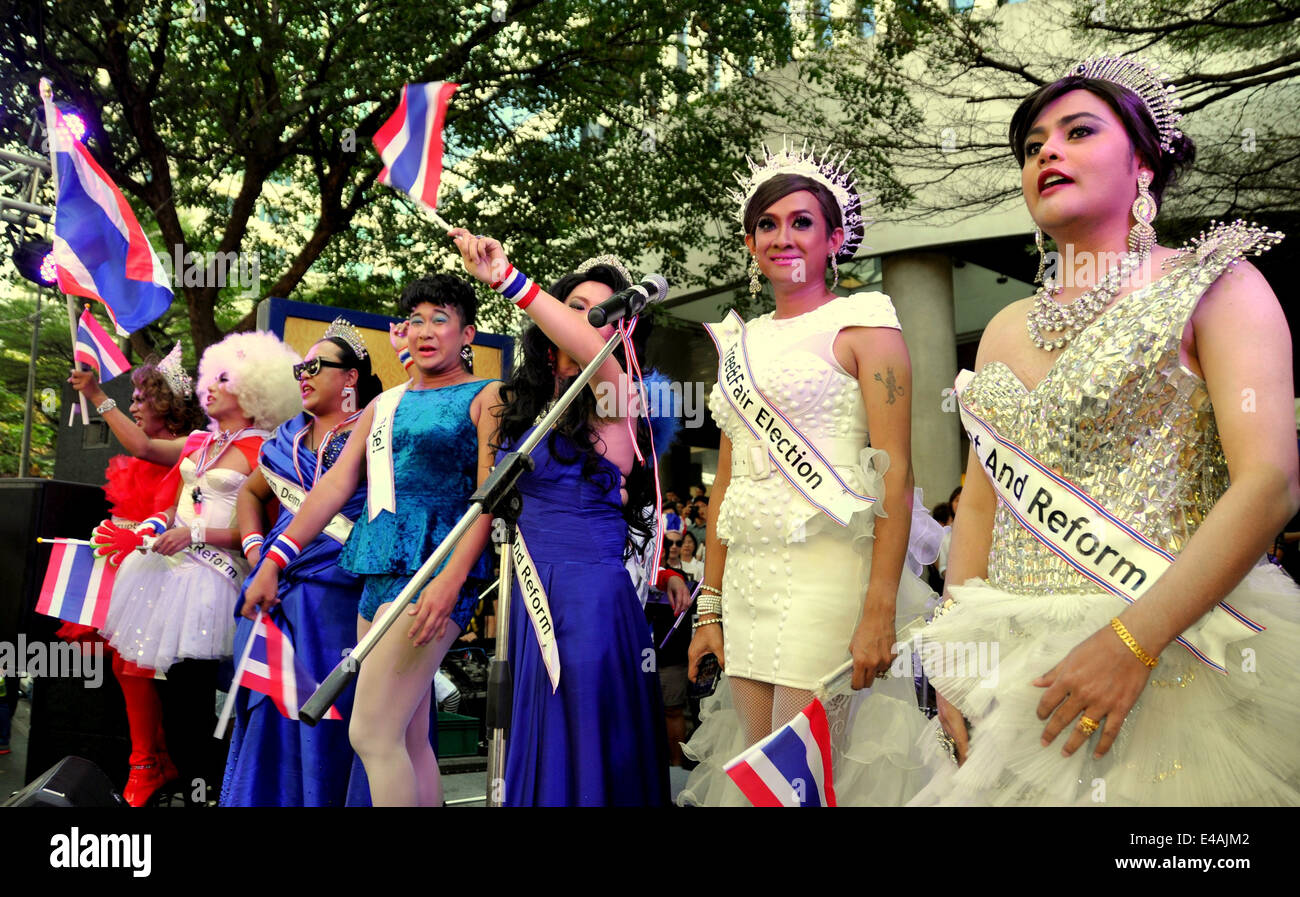 BANGKOK, THAILAND: Seven lady boys performing at an anti-government demonstration during the Shut Down Bangkok protest Stock Photo