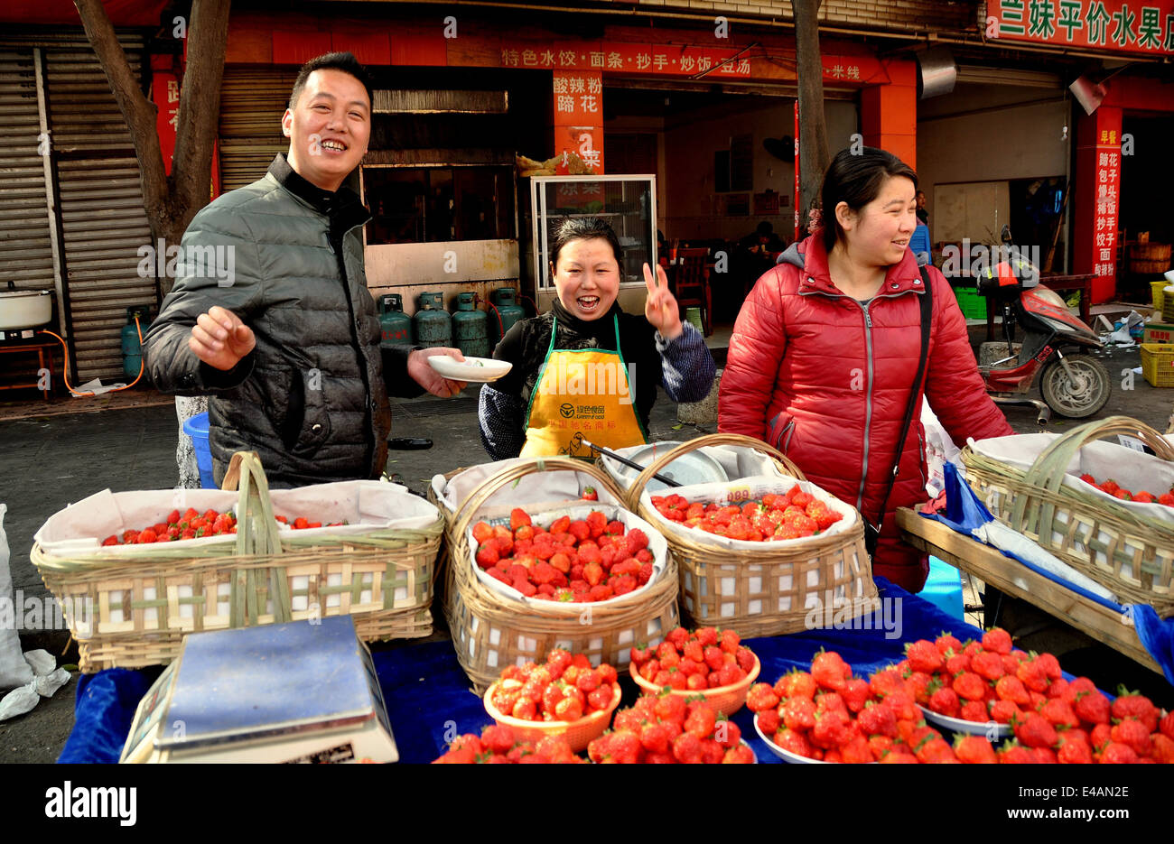 Pengzhou, China Chinese street vendors selling baskets of fresh