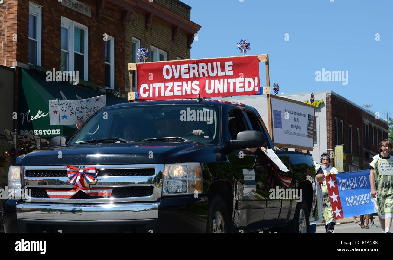 YPSILANTI, MI - JULY 4: Marchers opposed to the Citizens United decision march at the 4th of July parade on July 4, 2014 in Ypsi Stock Photo