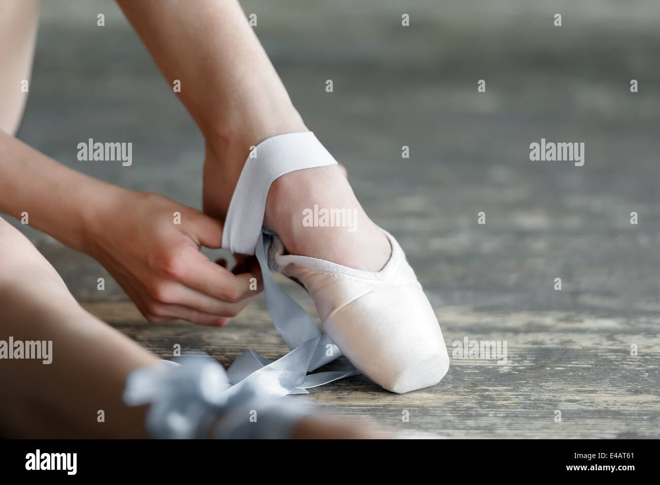 Taking off the ballet shoes after rehearsal or performance Stock Photo ...