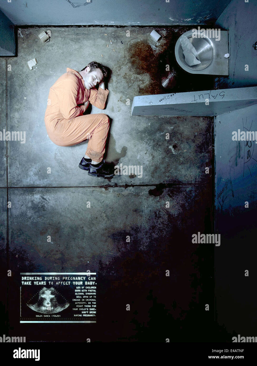 SANCA (South Africa, 2010) fetal alcohol syndrome awareness campaign poster. Criminal in fetal position. See description for more information. Stock Photo