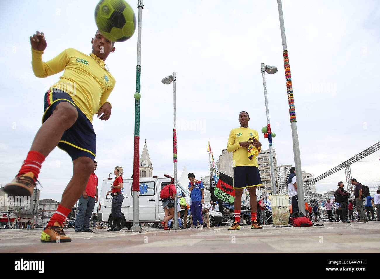 Sao Paulo, Brazil. 7th July, 2014. An athlete of Colombia controls the ball during the Street Football World Cup in Sao Paulo, Brazil, on July 7, 2014. This sports event attracted around 300 youngsters from 20 countries and regions all over the world. Differing from the conventional football match, the Street Football World Cup allowed athletes of different sexes to play together and there are no arbitrators. © Rahel Patrasso/Xinhua/Alamy Live News Stock Photo