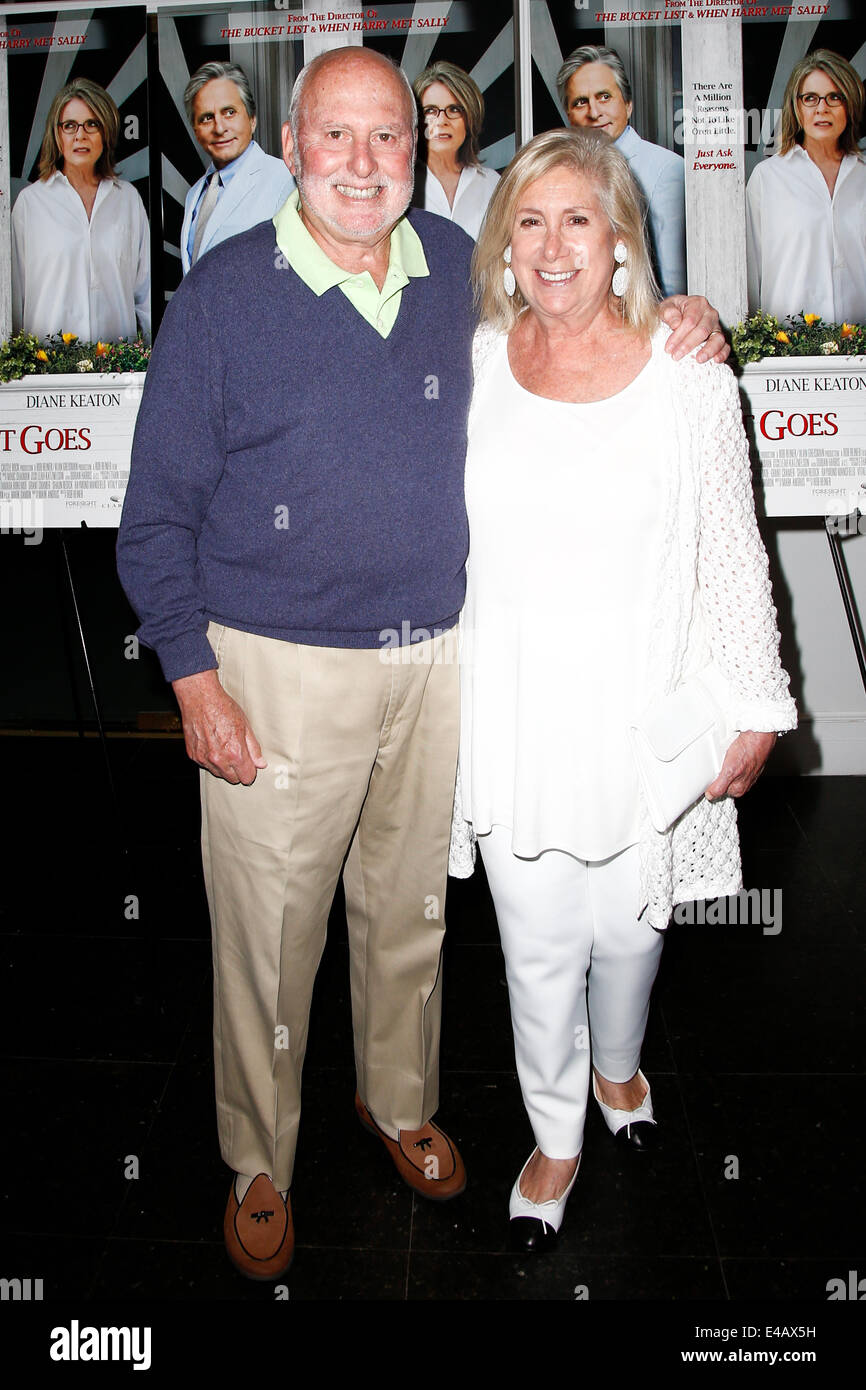 EAST HAMPTON, NEW YORK-JULY 6: Film executive Michael Lynne (L) and wife Ninah Lynne attend the premiere of 'And So It Goes' at Guild Hall on July 6, 2014 in East Hampton, New York. Stock Photo