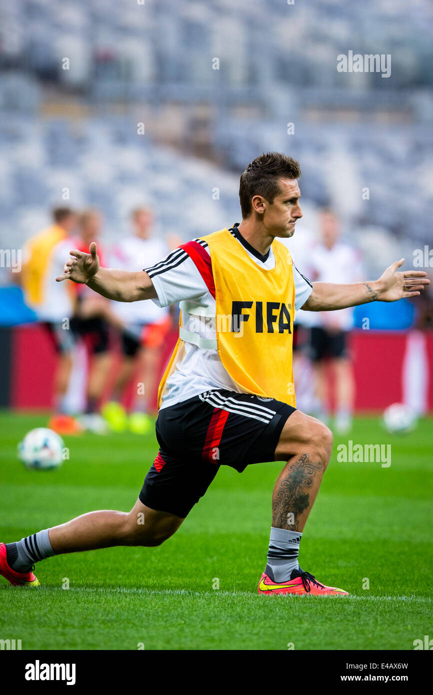 Belo Horizonte, Brazil. 7th July, 2014. Miroslav Klose of Germany warms up ahead of a training session in Belo Horizonte, Brazil, on July 7, 2014. Germany will play Brazil in their 2014 World Cup semifinal here on July 8. © Liu Bin/Xinhua/Alamy Live News Stock Photo
