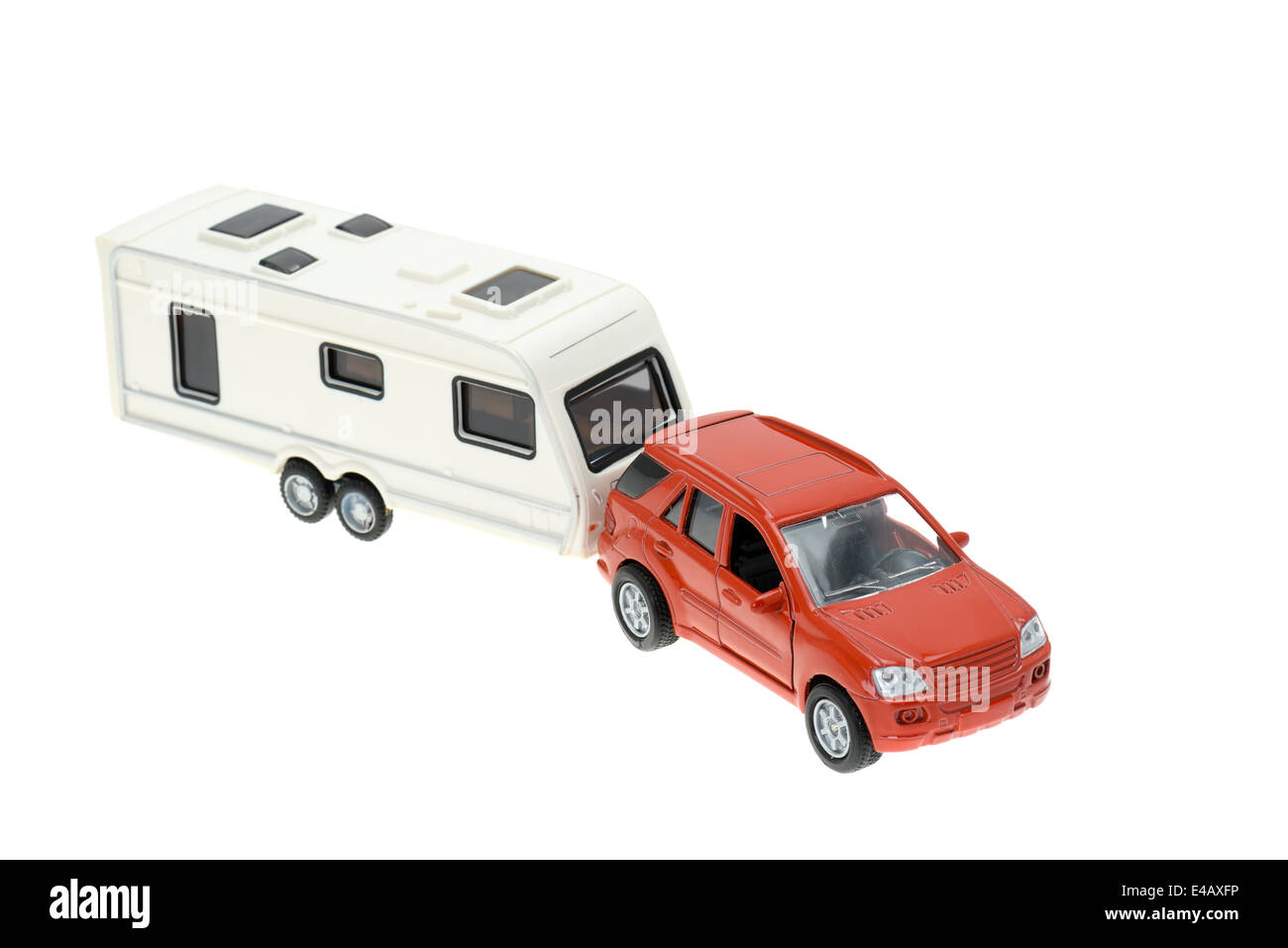 Car and a trailer caravan - travel concept. Studio shot with a white background Stock Photo