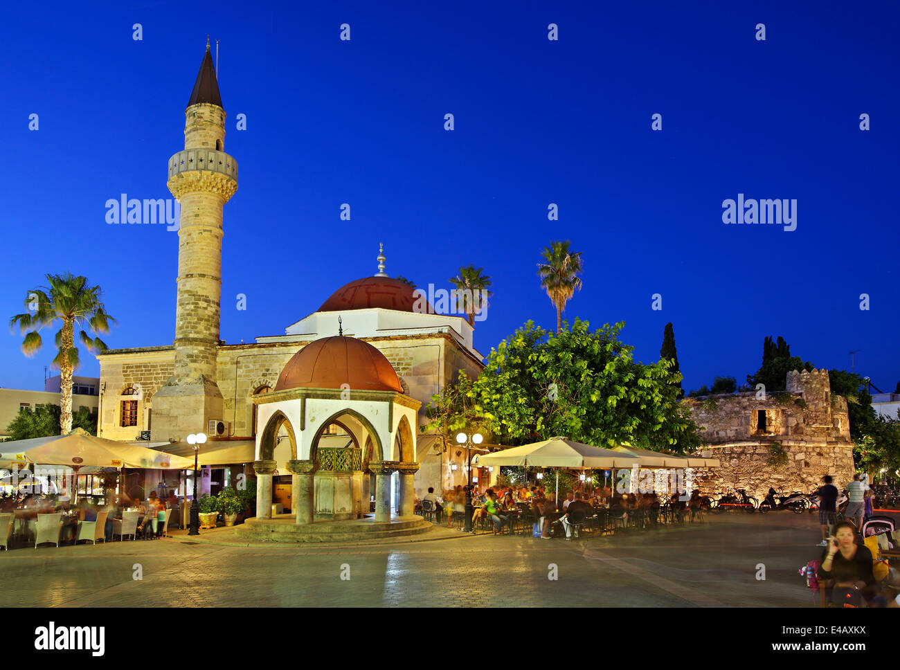 The Defterdar mosque and the walls of the ancient city of Kos, at Eleftherias square, Kos island, Dodecanese, Greece. Stock Photo