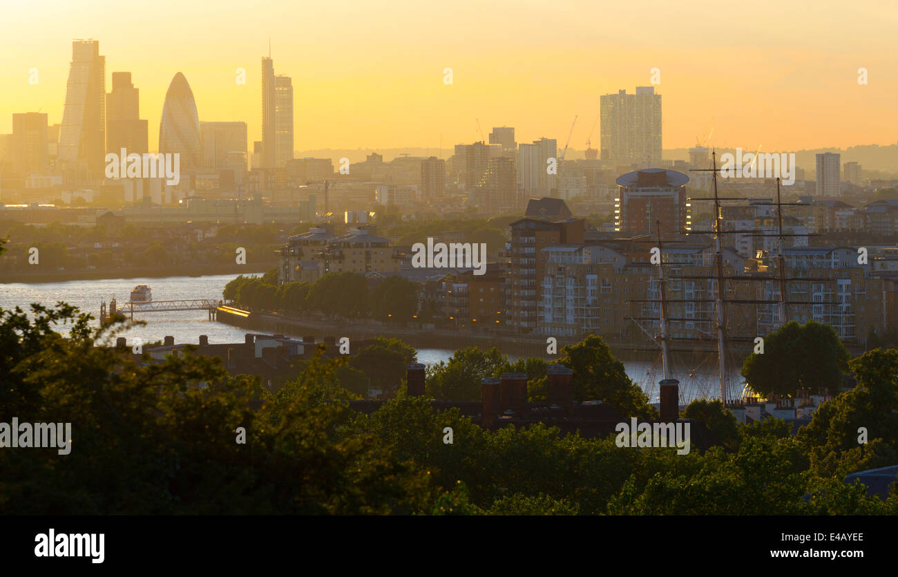 Summer Evening view up River Thames towards City of London from Greenwich Park  (Masts of Cutty Sark middle right of image) Stock Photo