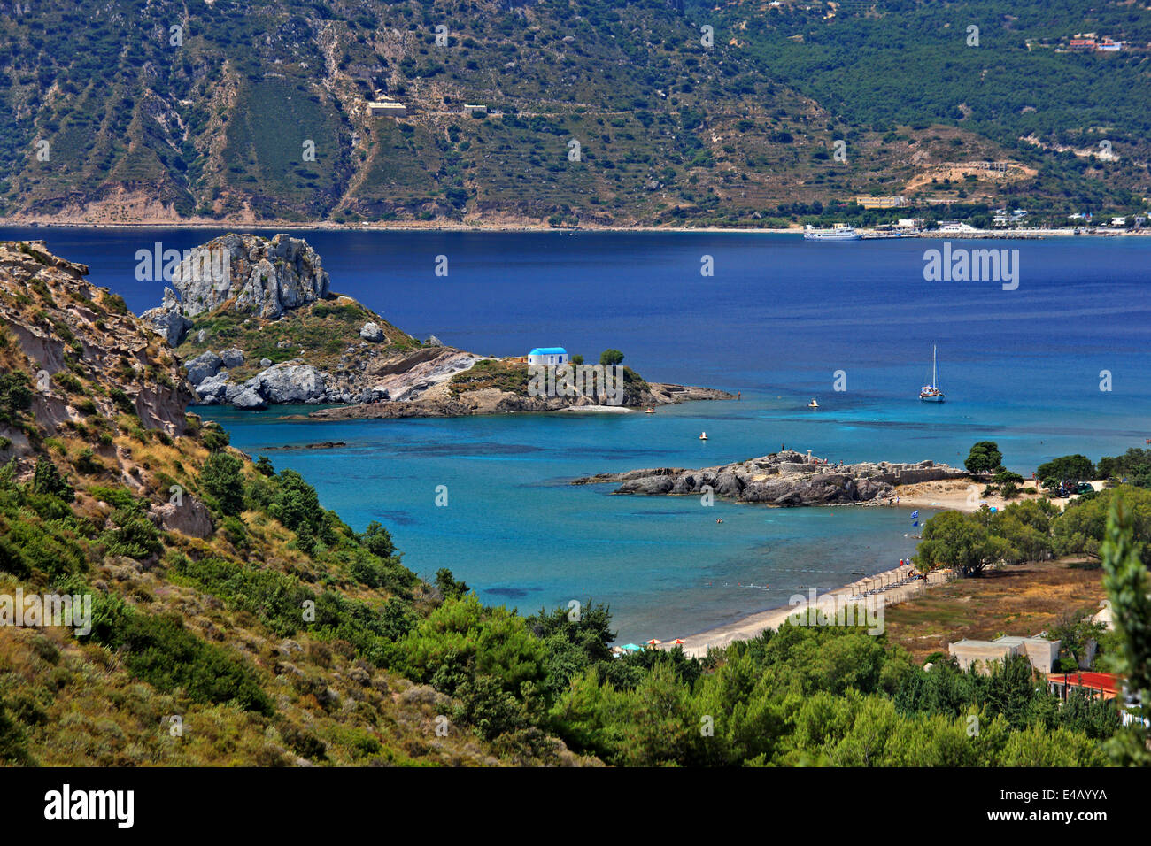 Kastri islet and the chapel of Agios Nikolaos, opposite to the early Christian Basilicas of Agios Stefanos, Kos island, Greece. Stock Photo