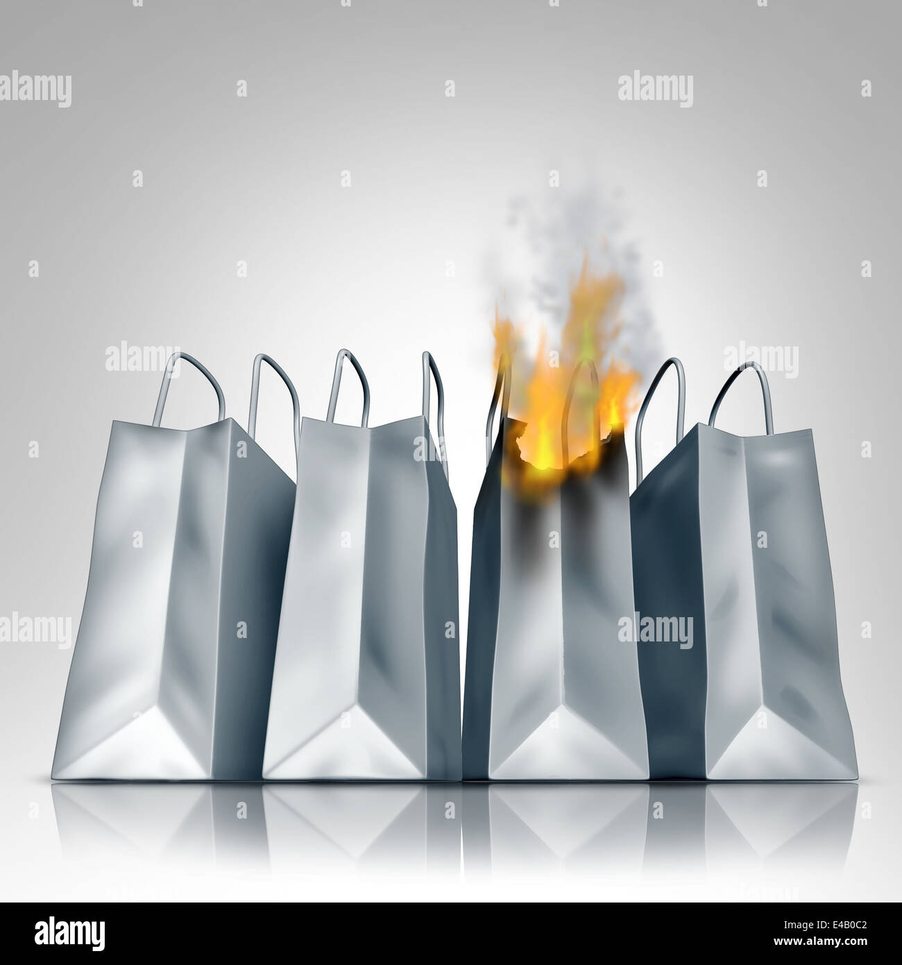 Losing sales business crisis concept with a group of shopping bags as one bag burns in flames as a financial symbol of market Stock Photo