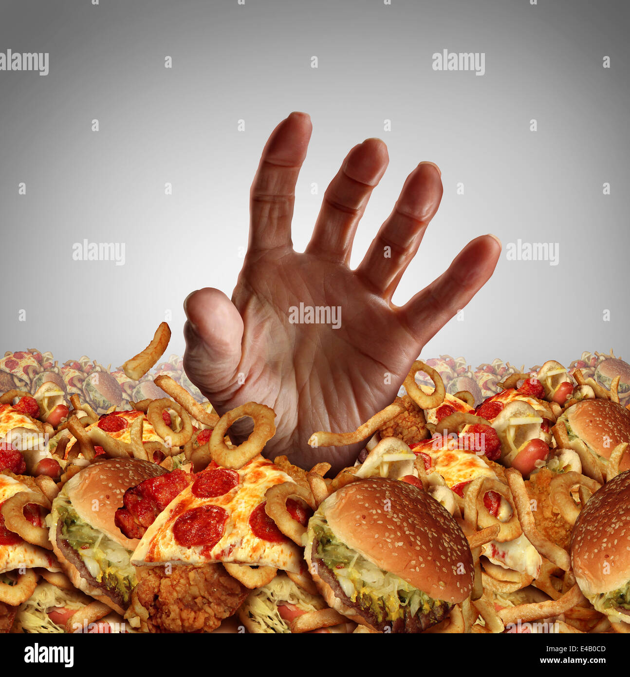 Obesity and overweight concept as the hand of a person emerging from a