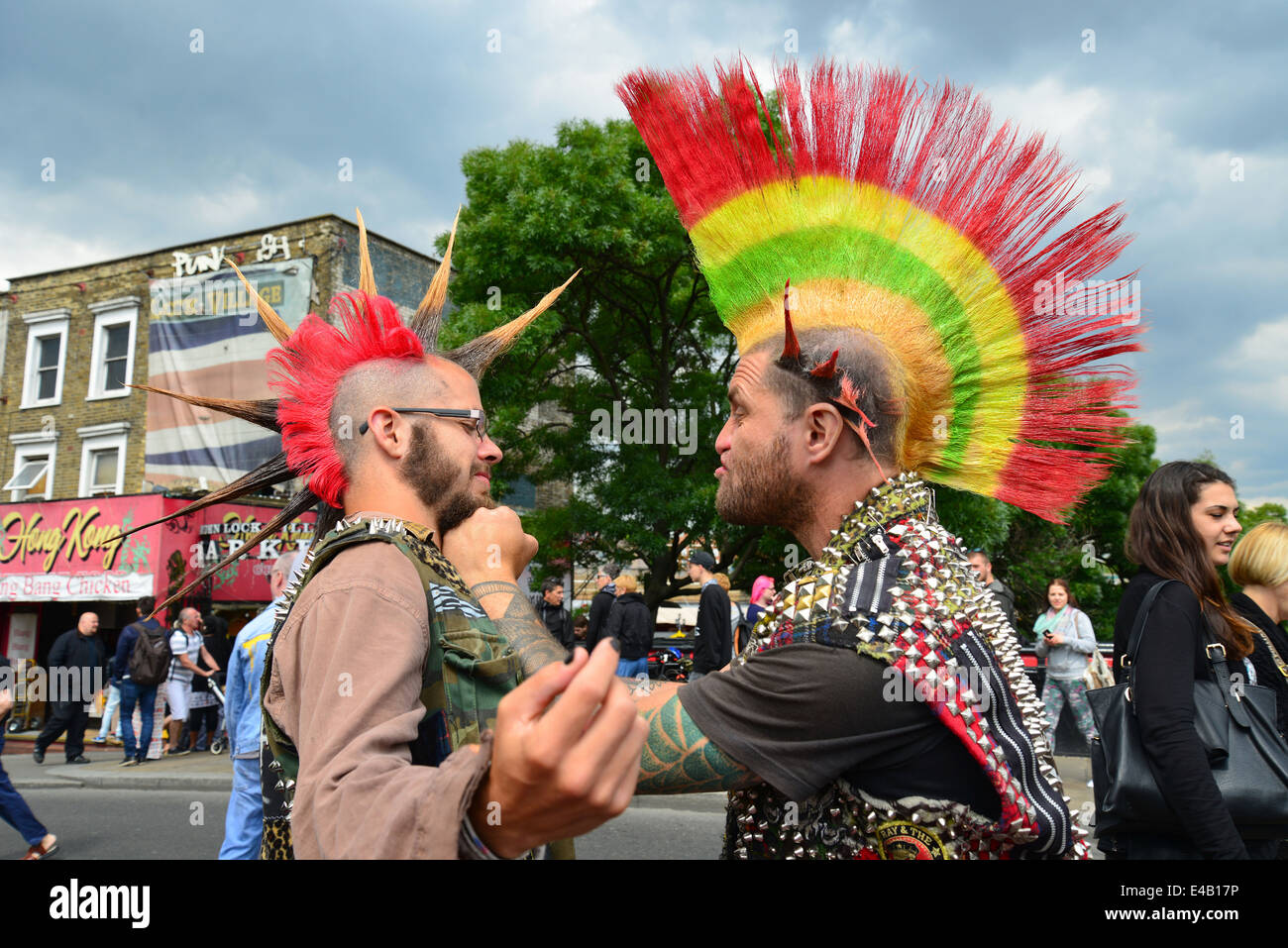 Punk rockers posing for tourists, Camden High Street, Camden Town, London Borough of Camden, London, England, United Kingdom Stock Photo