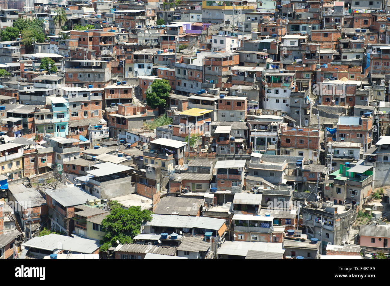 Crowded Brazilian favela shanty town spans the valley in Rio de Janeiro Brazil Complexo Alemao Stock Photo