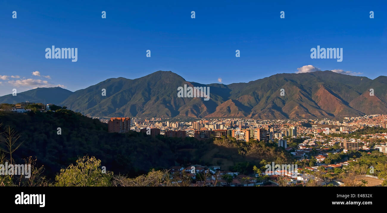 Panoramic view of city of Caracas at foot of the Avila mountain.Venezuela. Stock Photo