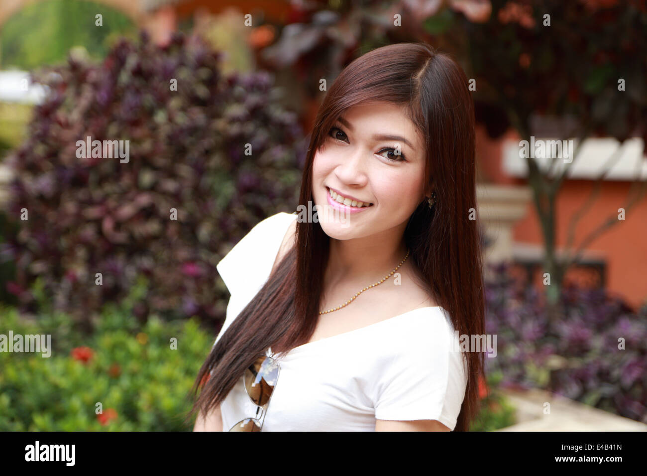 portrait beautiful woman in the garden Stock Photo - Alamy