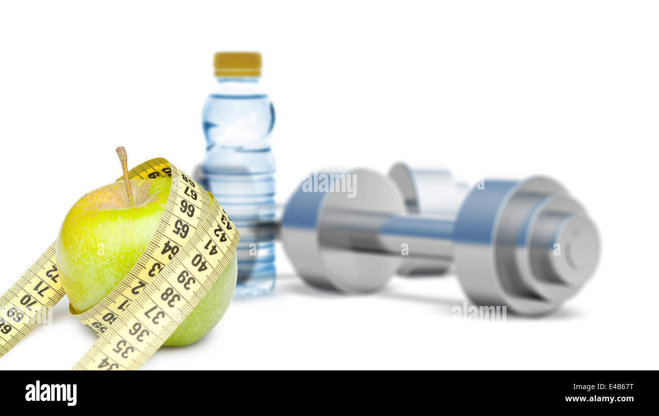 Dumbbells with an apple and measuring type Stock Photo