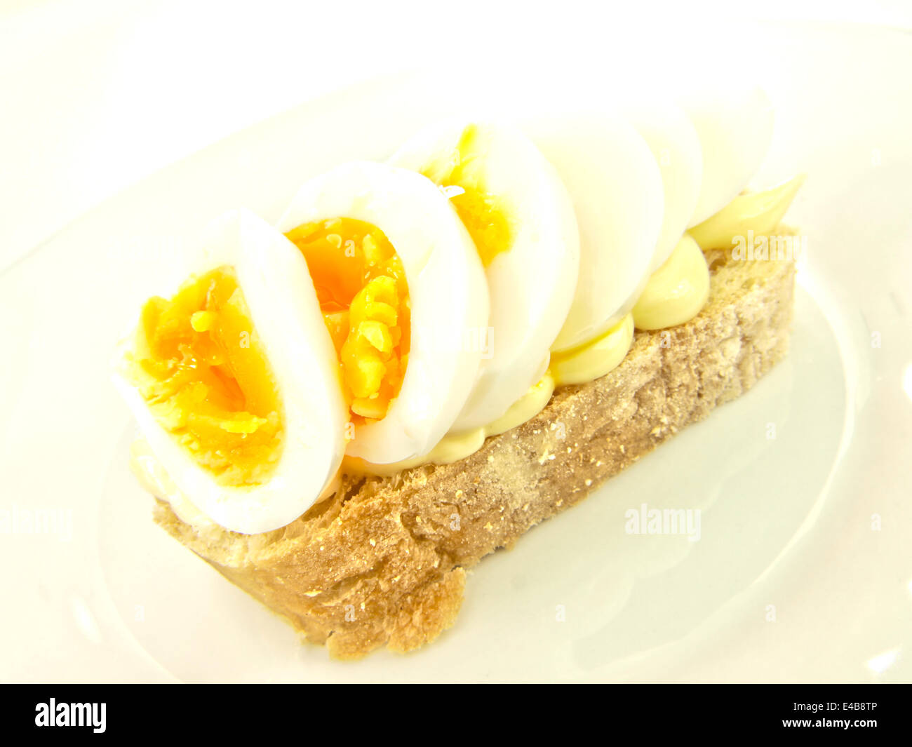 Soft boiled egg sandwich Stock Photo