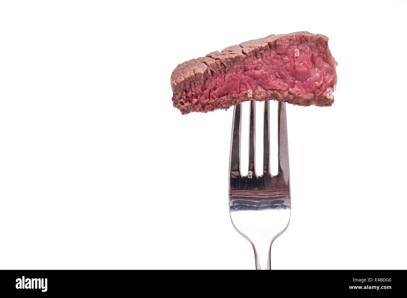 Rare beef on a fork Stock Photo - Alamy
