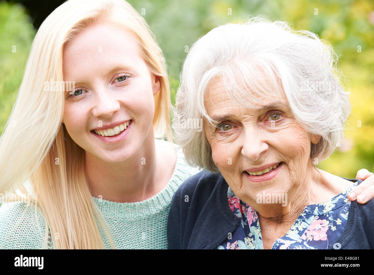 Outdoor Portrait Of Grandmother And Granddaughter Stock Photo