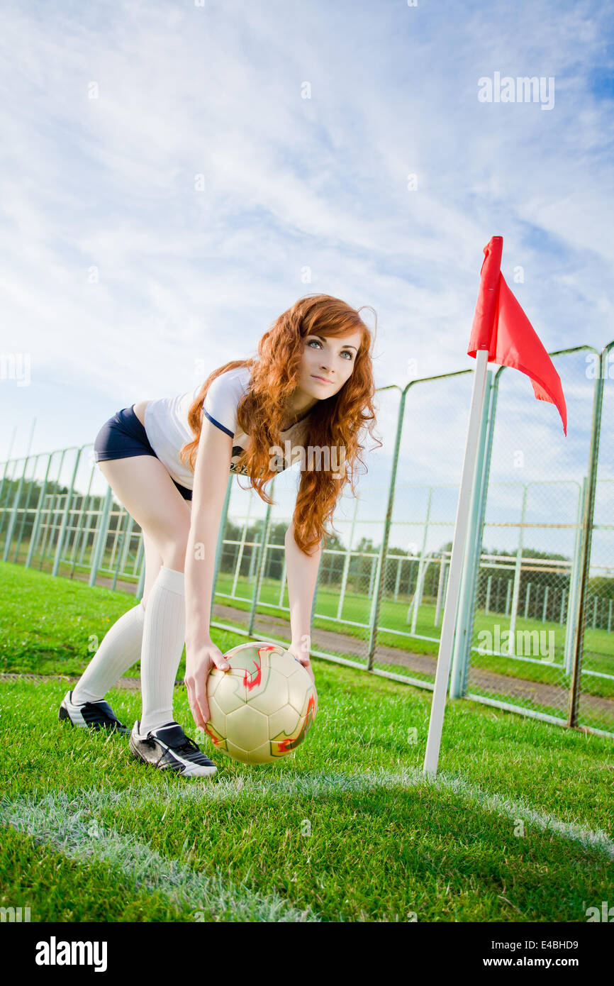 Girl dribbling soccer ball hires stock photography and images Alamy