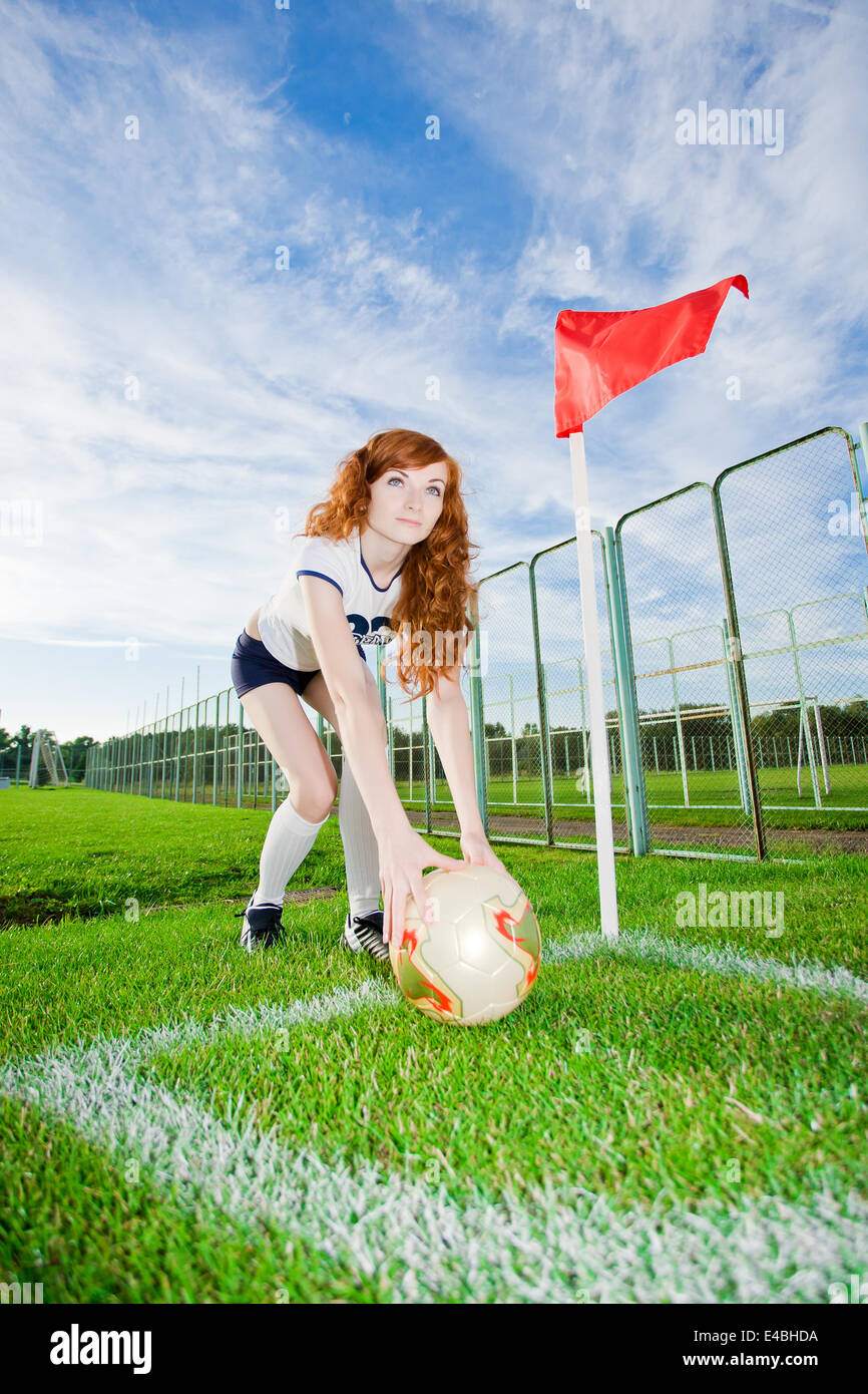 Girl plays soccer ball hires stock photography and images Alamy