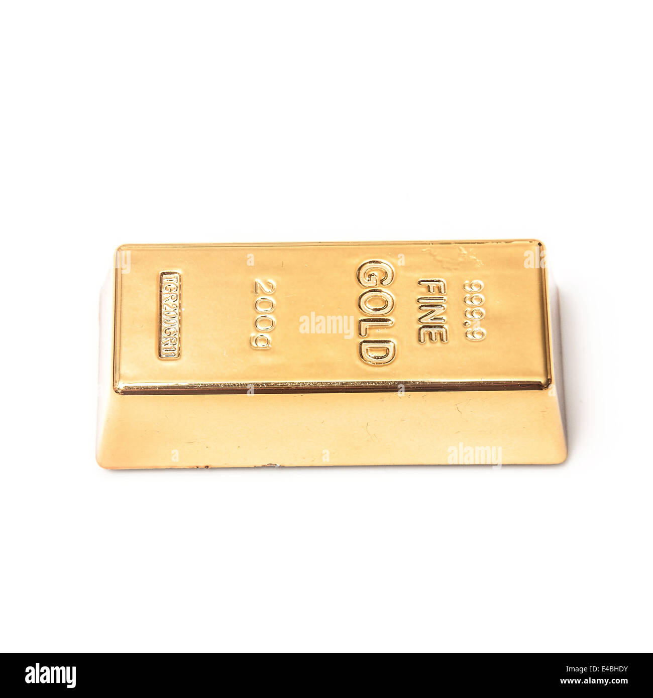200 gram gold bar or ingot isolated on a white studio background. Stock Photo