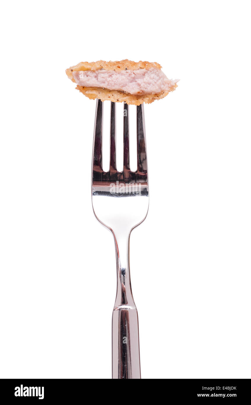 Veal escalope on a fork Stock Photo