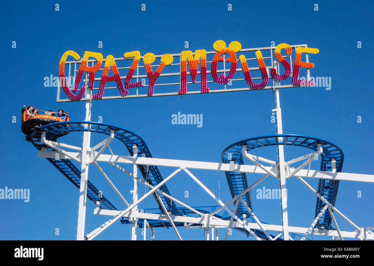 Seafront Fun-fair rides on 'Crazy Mouse' at Weston-super-mare, Somerset, England, UK Stock Photo
