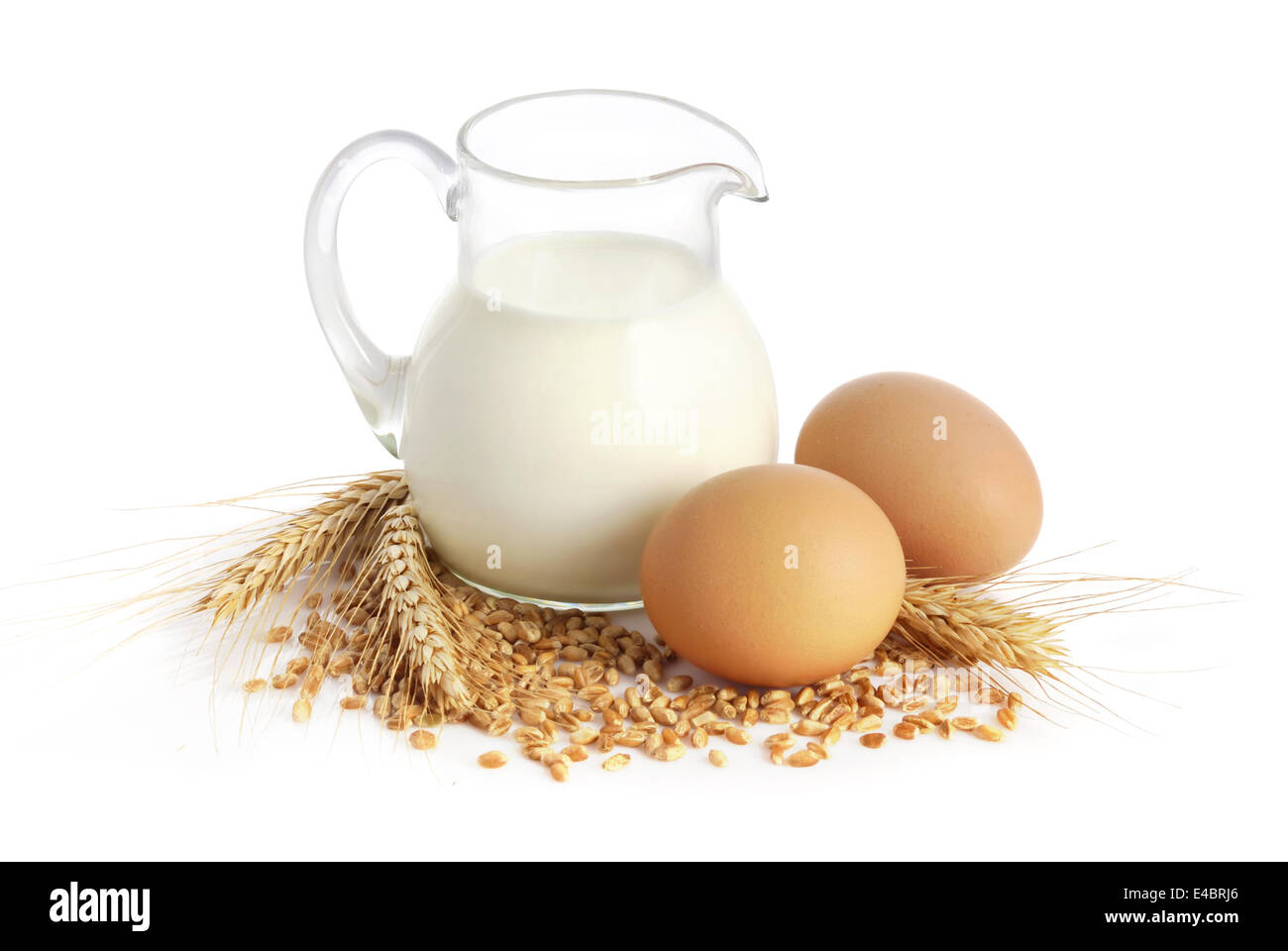 Fresh milk, wheat seeds and two eggs Stock Photo Alamy